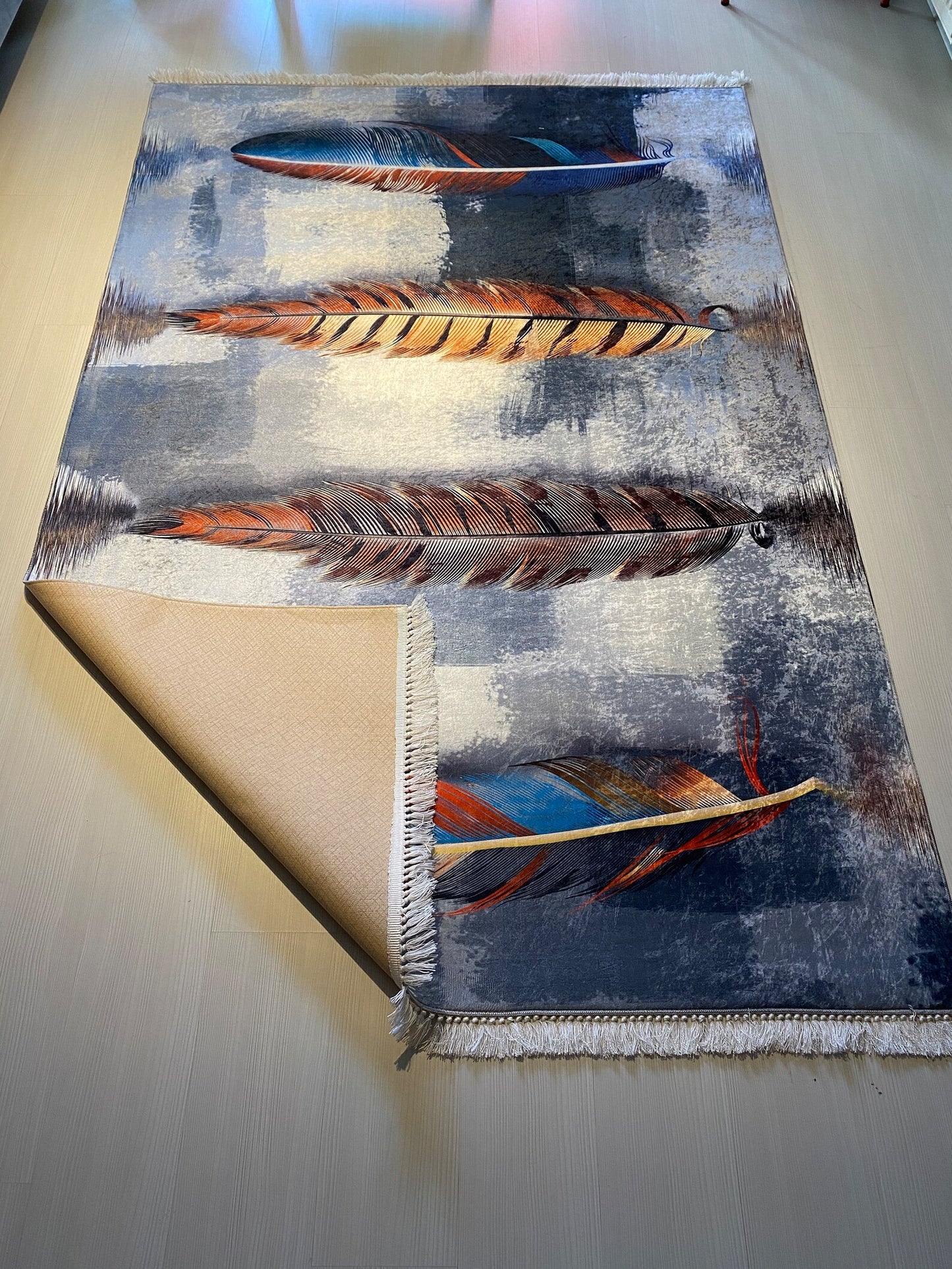 Tapis le design à trois ressorts soigneusement tricoté
